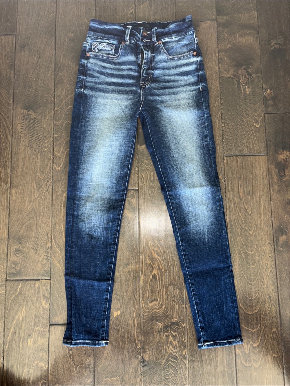 Buckle Dark Blue Skinny Jeans with Faded Whiskering